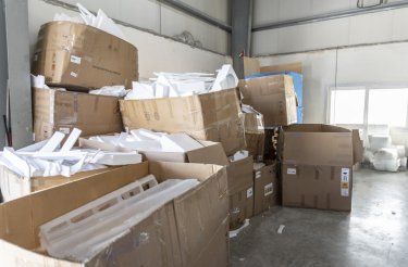 polystyrene waste in cardboard boxes